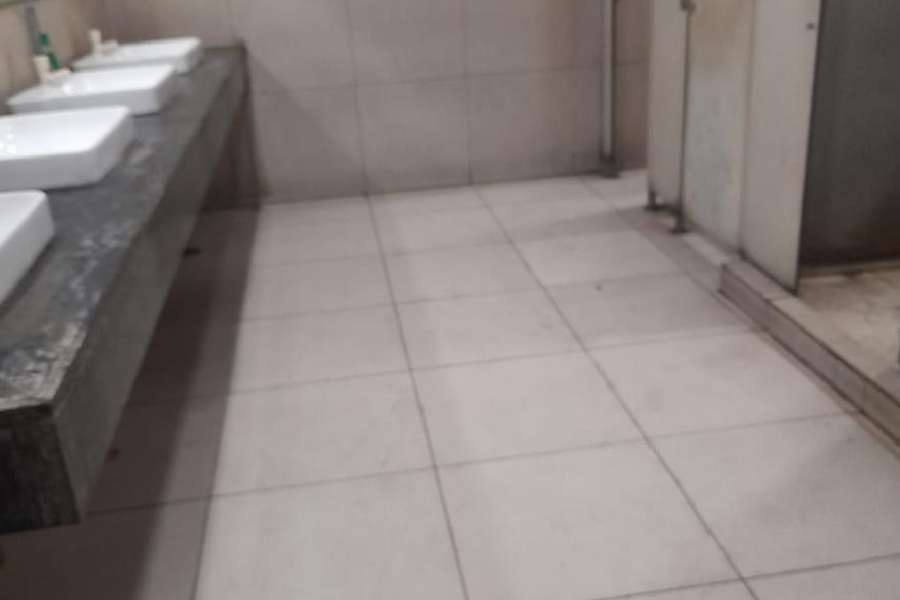 A dirty washroom at the airport in January