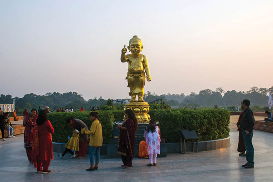 A statue of infant Buddha in the Lumbini complex