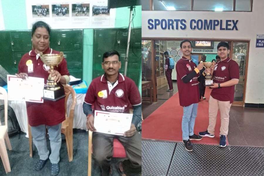 (Left) Sipra Singha and her  friend Shibnath Shaw with their trophy; Arpan Guha and (right) Soutrik Ray with their trophy.