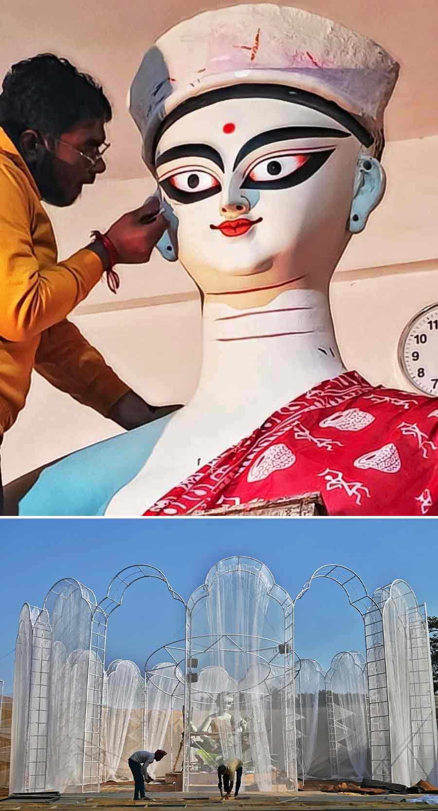 (Top) An artist paints the eyes of an idol of goddess Saraswati in Krishnanagar on Saturday and (above) a puja pandal being built at Tala Prottoy in north Kolkata