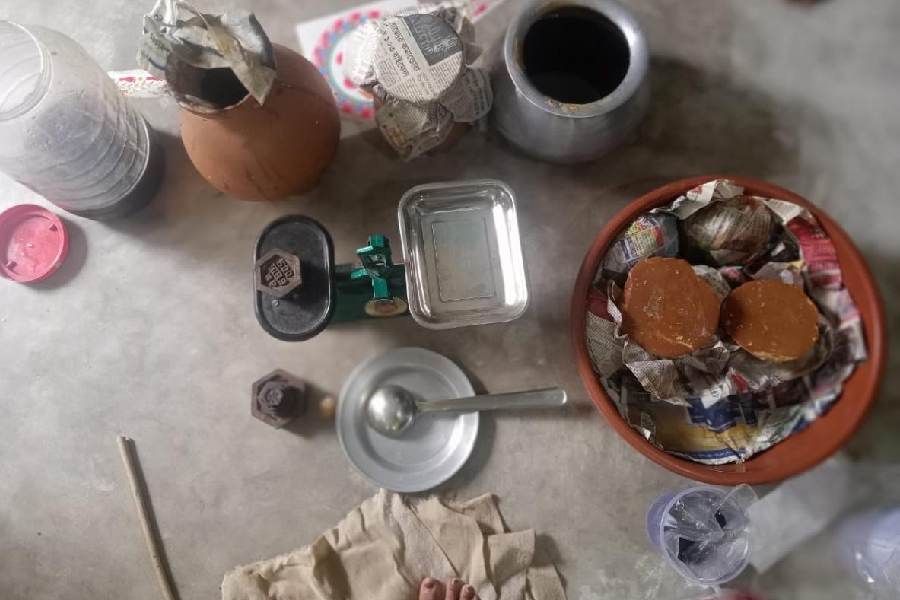 The jaggery stock and a weighing scale at the survivor’s North 24-Parganas home