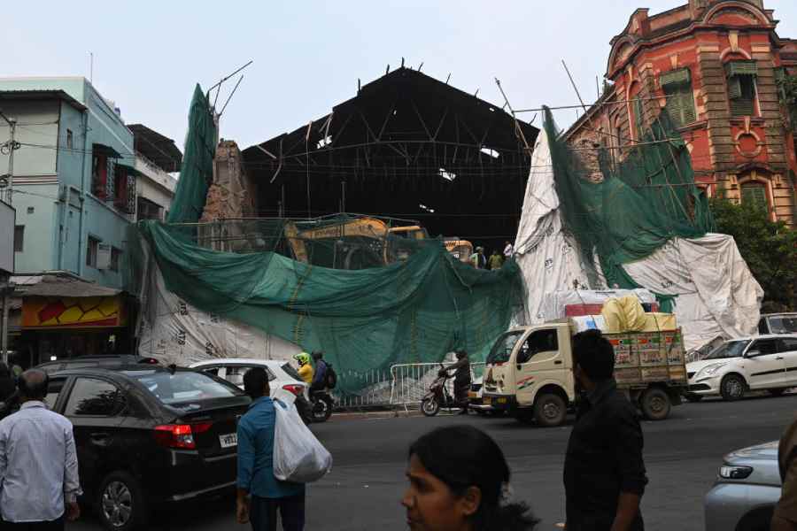 Elite Cinema being demolish on SN Banerjee Road on Monday afternoon.