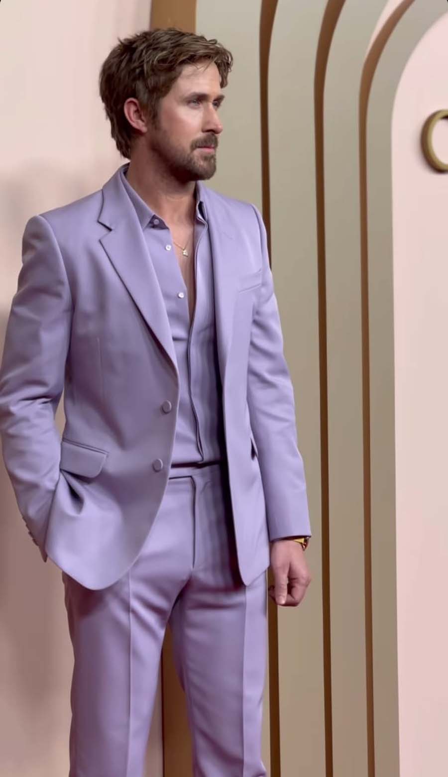 Robbie’s co-star Ryan Gosling, nominated for Best Actor in a Supporting Role for his portrayal of Ken in Barbie, looked dapper in a lavender pantsuit.  