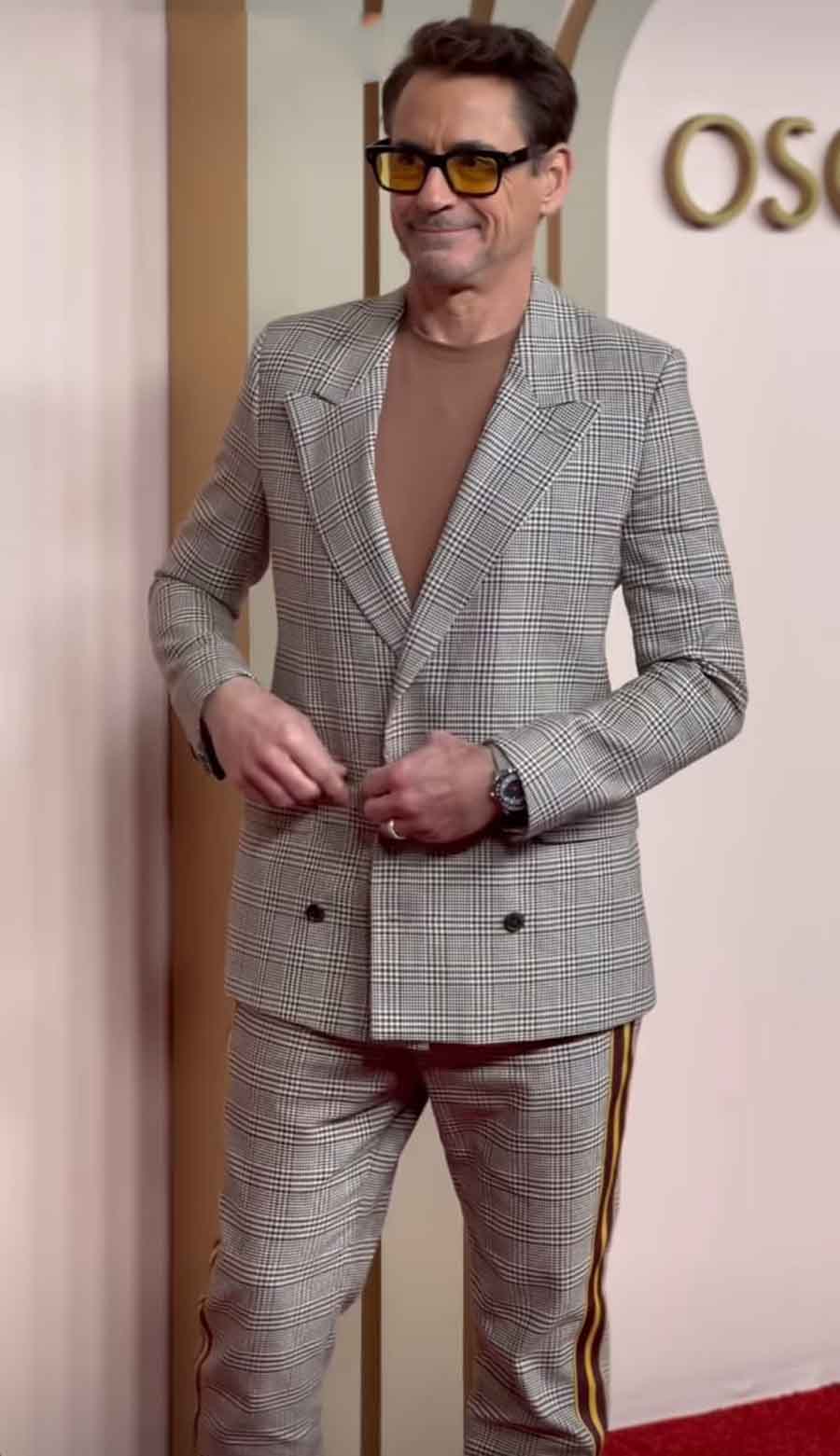 Robert Downey Jr., known for essaying the role of Iron Man in MCU films, donned a checkered grey suit on the occasion. 