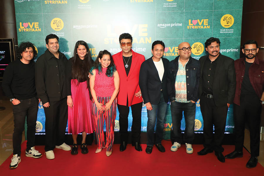Karan Johar with co-producers and directors of Love Storiyaan.