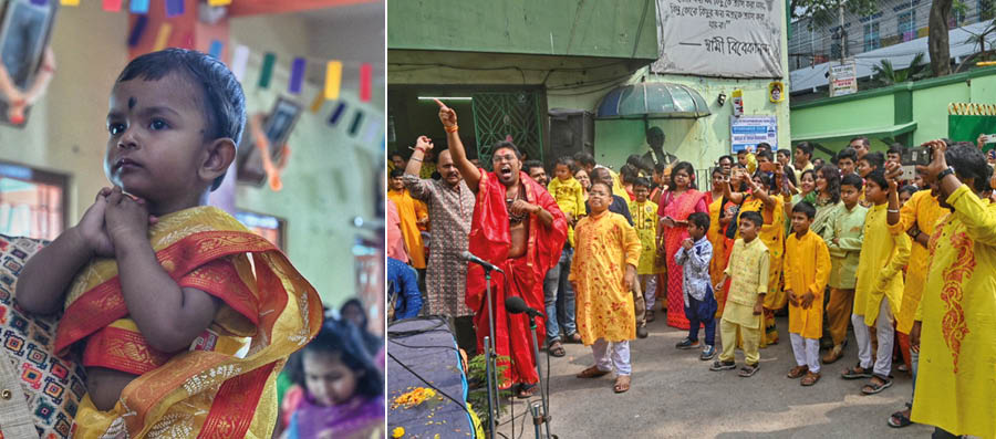 A toddler is a picture of devotion and (right) a priest reads out mantras over the microphone for devotees at another city school