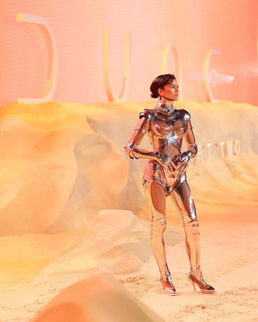 Zendaya, who plays young Fremen warrior Chani in the upcoming sequel to the 2021 blockbuster Dune, stunned in a sleek metallic bodysuit with cutouts around the chest, waist and thighs.