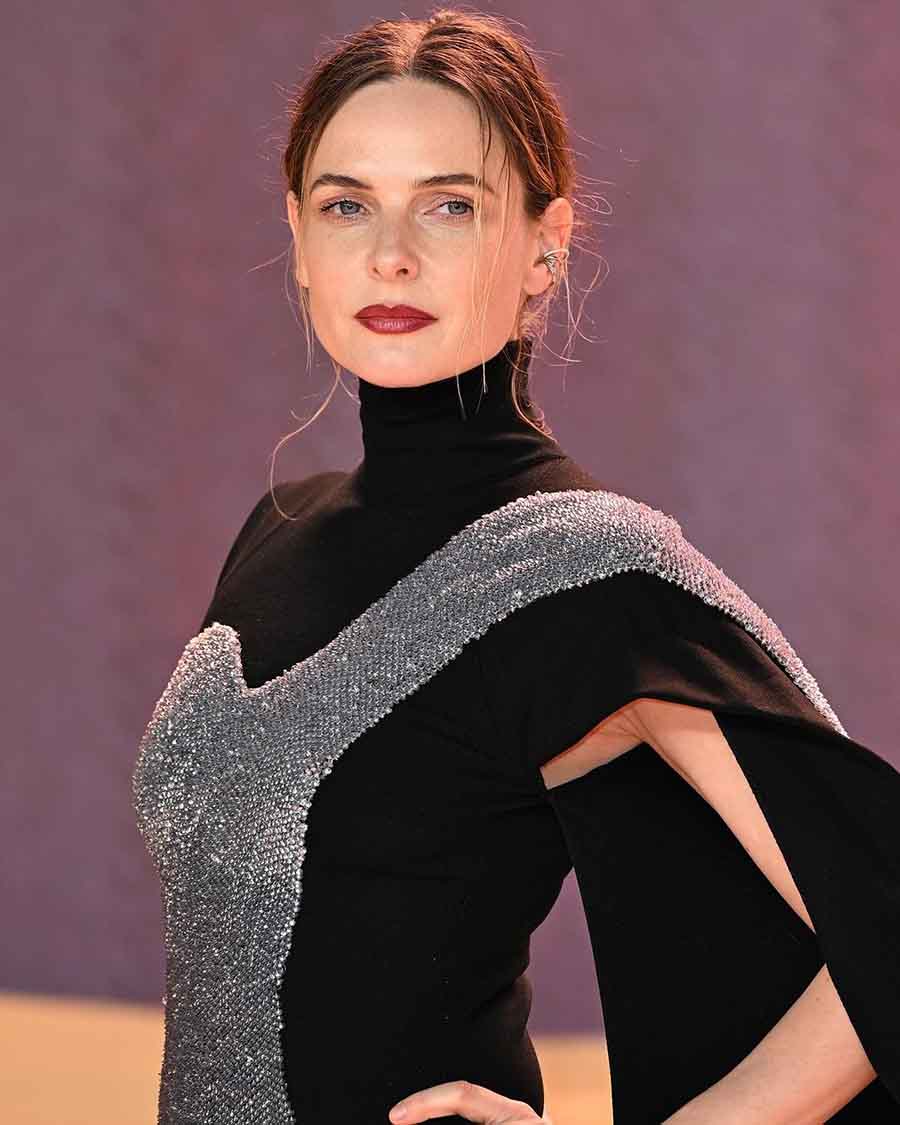 Rebecca Ferguson, who reprises her role as Paul’s Lady Jessica in the sequel, walked the red carpet in a black-and-silver embellished gown featuring a dramatic drape over the left shoulder. 