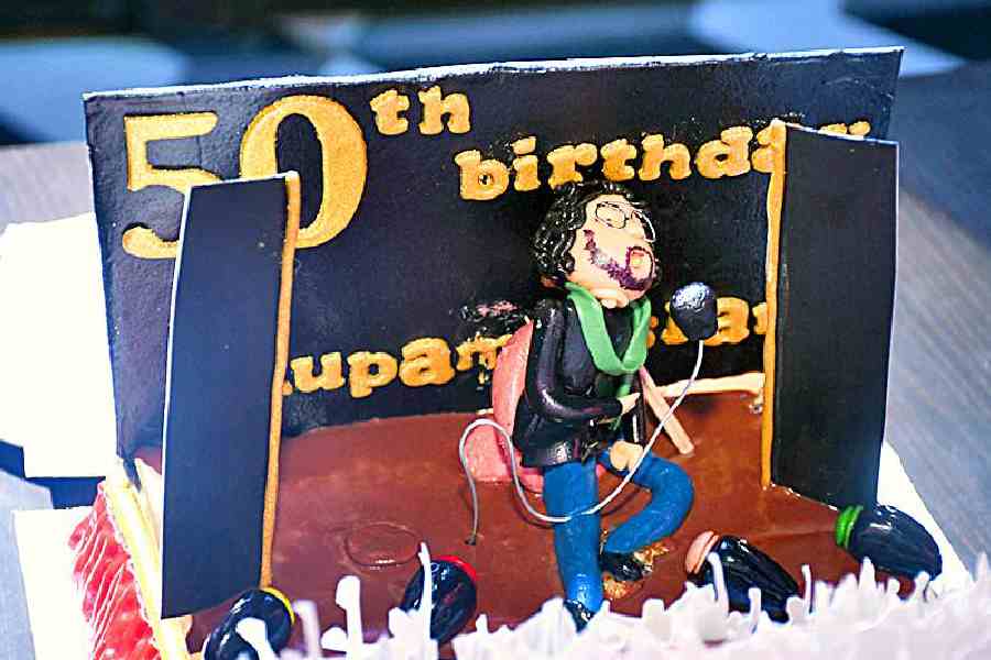 A cake which featured a miniature model of the singer