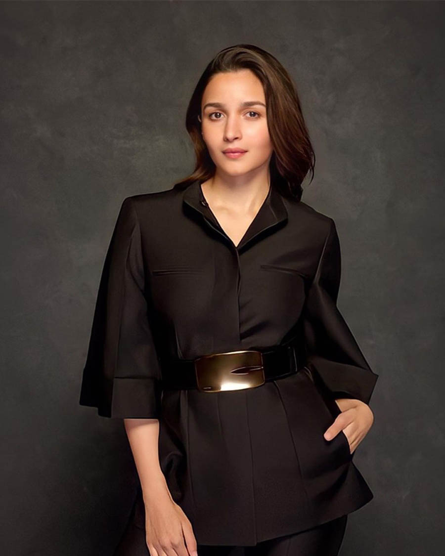 The National Award-winning actress exuded boss lady vibes in a black belted blazer with short bell sleeves, which she paired with matching black trousers.  