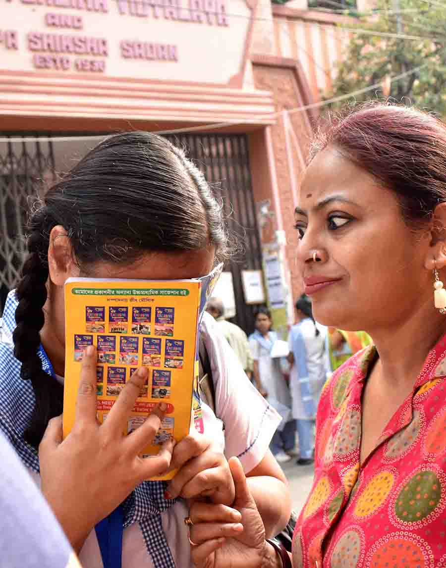 A candid moment captured just before the exams started at 2,341 venues across West Bengal