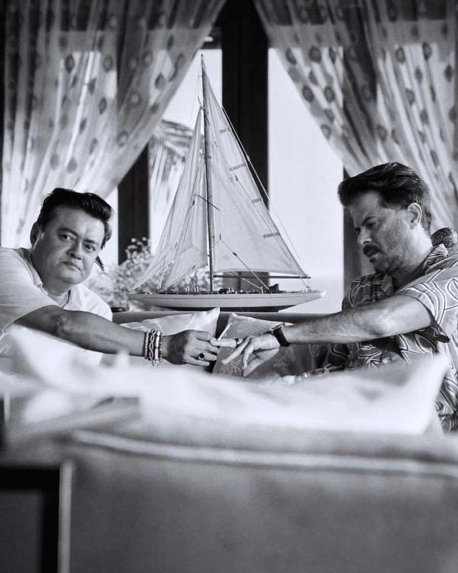 Anil and Saswata share a candid moment on the sets of the show.   