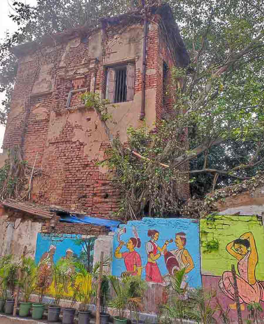 Graffiti on the walls of broken houses in Bhowanipore on Saturday