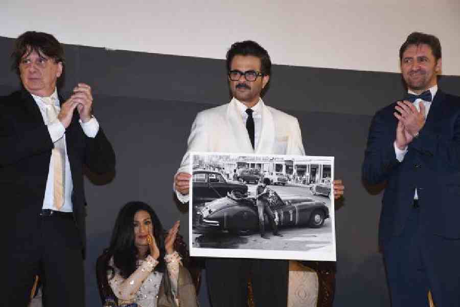 Anil Kapoor being handed a copy of his photograph clicked in 1980 during the shooting of Kahan Kahan Se Guzar Gaya by Nemai Ghosh