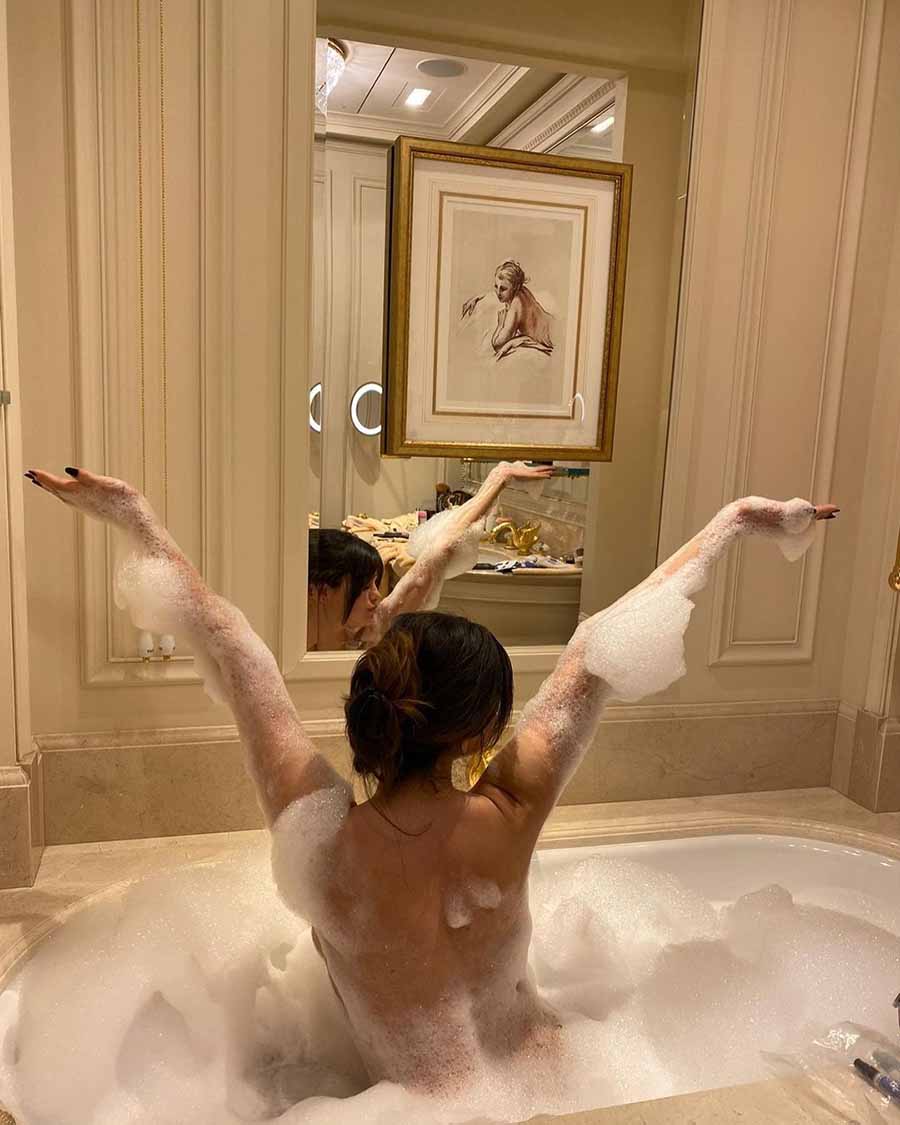 Gomez shared a quirky picture of herself lathered in a bathtub. “40 hours. Paris. LOVE ON 2/22 🤍🔒,” the 31-year-old captioned her post. 