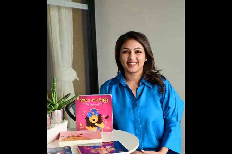 Chitwan Mittal poses with some of her most popular titles. Pagdi for Sinh is a delightful tale in which wild animals go shopping for Indian clothes