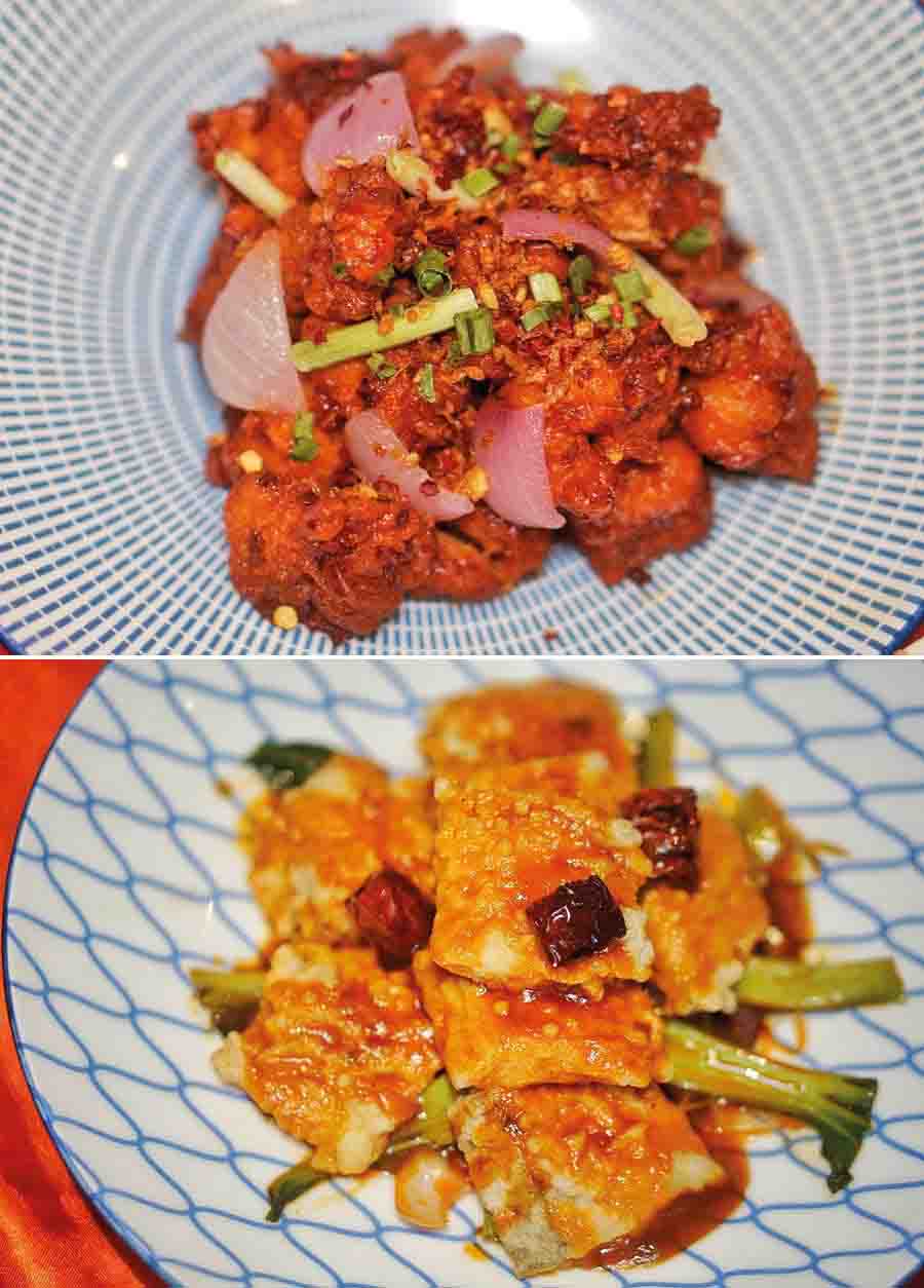 If you love a kick of heat in your food and are fans of the quintessential chilli chicken or chilli fish, then non-veg mains are right up your tastebuds. The (top) Spicy Dry Fried Chicken and a Flaming Fiery Bhetki feel like an upgrade on the quintessential Indo-Chinese favourites