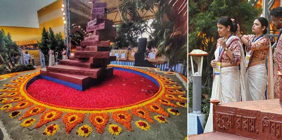 The martyrs’ altar was bedecked with flowers at Deshapriya Park on Wednesday before the state programme to mark Bhasha Divas and (right) a woman preps another’s hairdo 