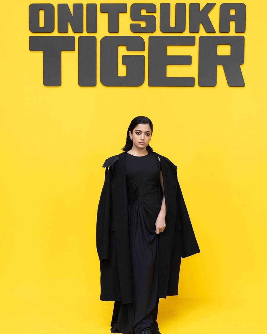The Geetha Govindam actress, who will be next seen in Pushpa 2: The Rule alongside Allu Arjun, posed for the lens in front of a banner of Onitsuka Tiger. 