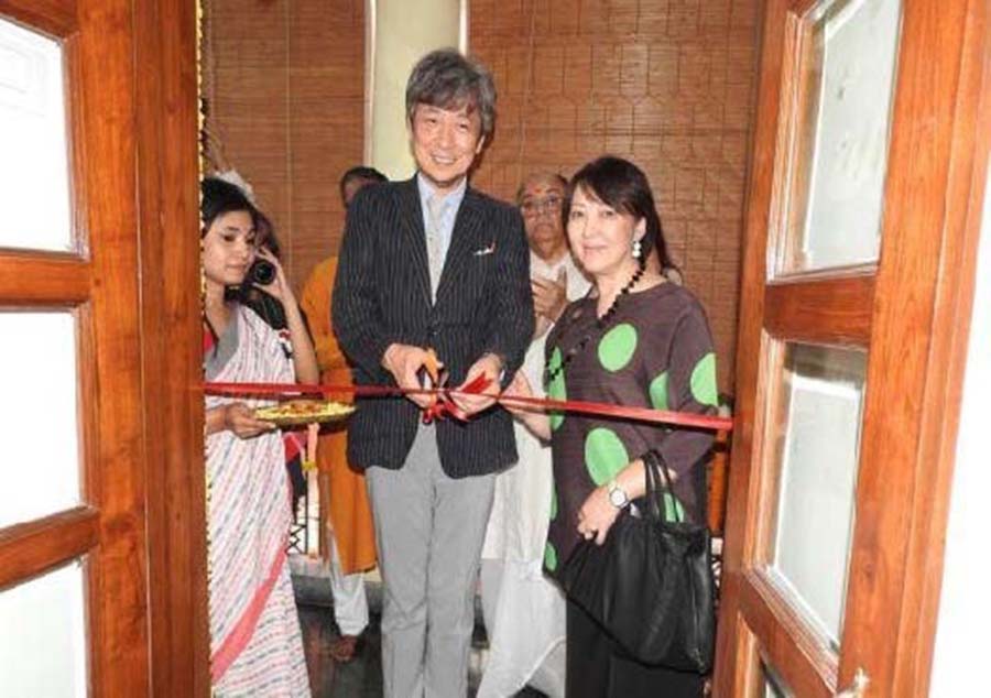Consul-general of Japan Nakagawa Koichi cuts the ribbon of the refurbished Japan gallery at the Rabindra Bharati museum in Jorasanko Thakurbari in Kolkata on February 19