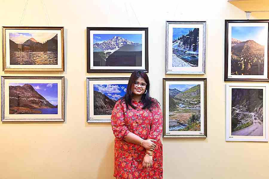 Rupkatha poses in front of her ‘Landscape’ photograph