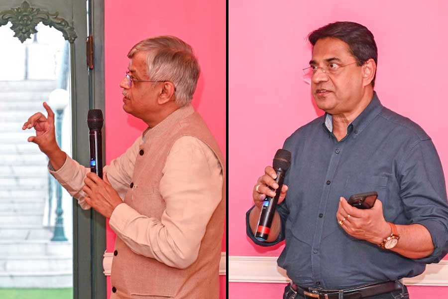  Sudhir Mishra and (right) Soumen Mitra speak about law enforcement practices 