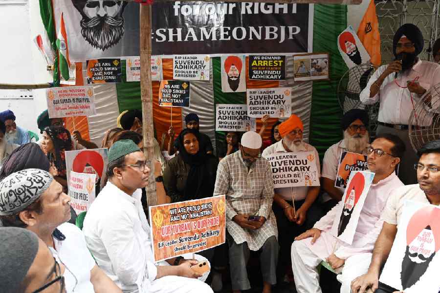 Sikh protesters joined by members of other communities in front of the state BJP headquarters on Friday.