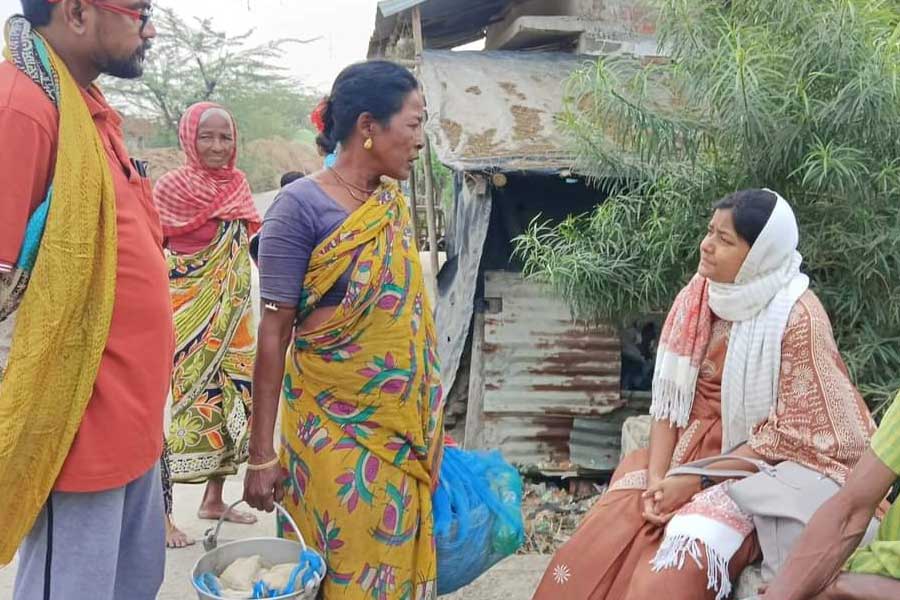 Minakshi Mukherjee with residents of Sandeshkhali on Saturday