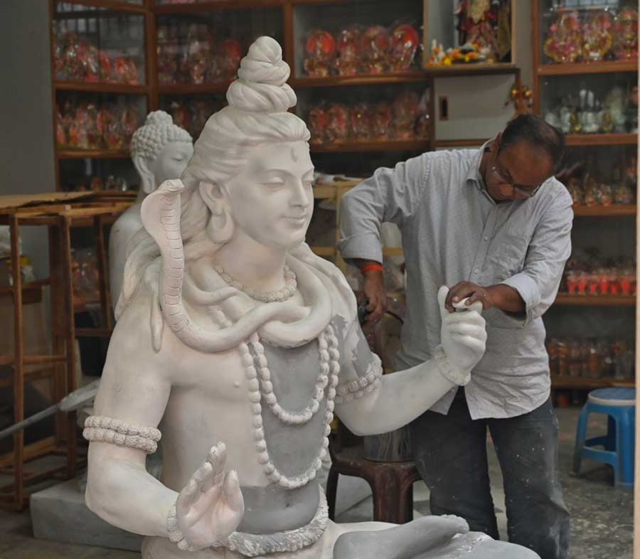 A Kumartuli artist lends final touches to an idol of Lord Shiva on Saturday. This year, Mahashivratri falls on March 8
