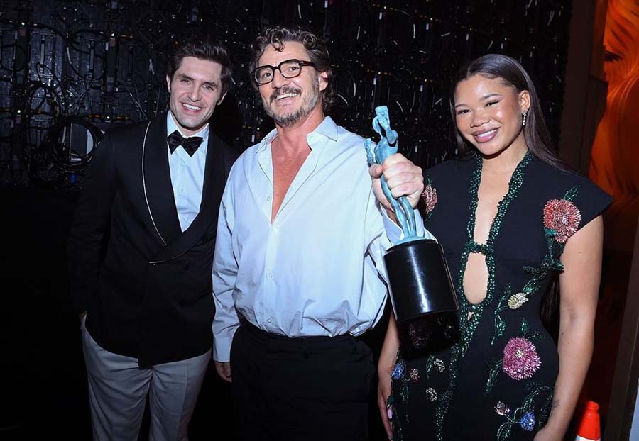 Pedro Pascal clinched the SAG award for Outstanding Performance by a Male Actor in a Drama Series for The Last of Us. He posed with his co-star Storm Reid and Ted Lasso actor Phil Dunster.
