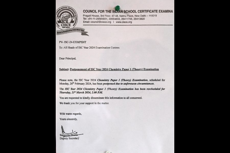 The notice announcing the postponement of the exam outside Calcutta Girls School on Monday.