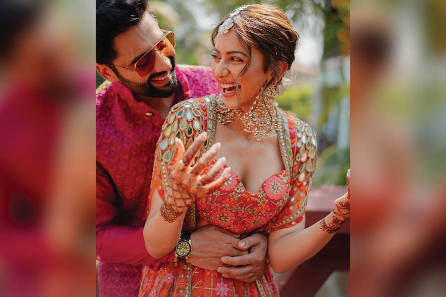 Bride Wore Modern 'Phulkari' Red Lehenga Designed By Manish Malhotra For  Her Wedding Day