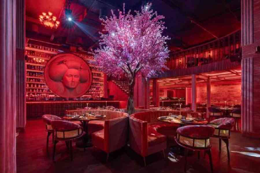 Done in shades of red with warm ambient lighting, this dine den is also a great Instagrammable spot.