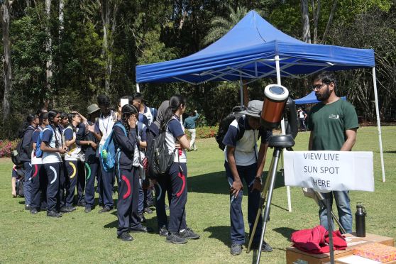 The visitors explored the intricate realms of astronomy with the help of an array of scientific wonders.
