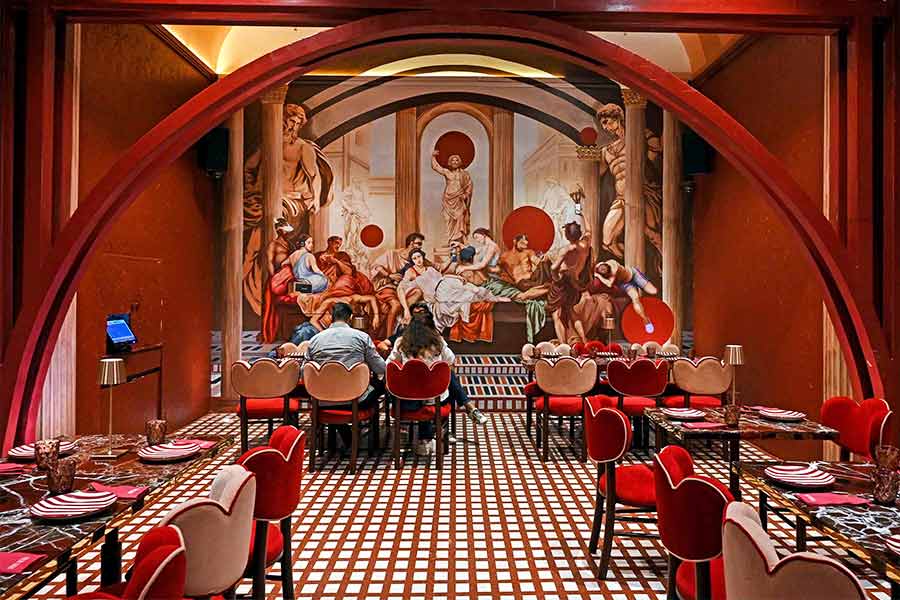 The ambience at Pepe Rosa is all about old-world elegance, from velvet cushioned seating to Roman artwork on the walls