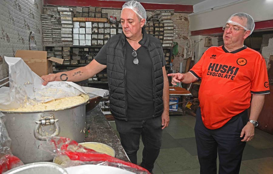 A glance at the walnut cake batter, left to rest in a large vessel, as it awaits its journey into cake moulds destined for the coal-fired oven. Using a trolley system, the mixture is transported to the ground floor for baking