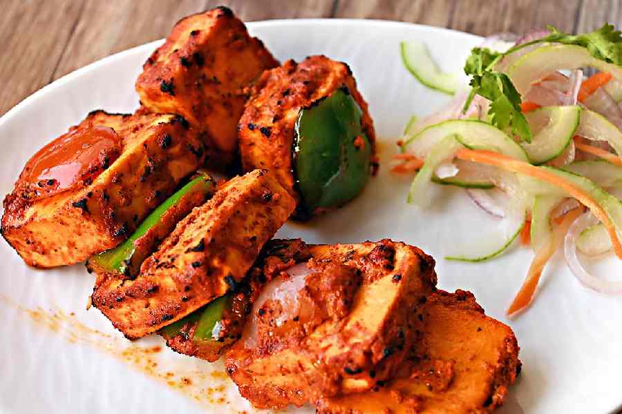 The Paneer Tikka is coated in spices and grilled to perfection, resulting in soft, buttery bites that serve as an ideal appetiser