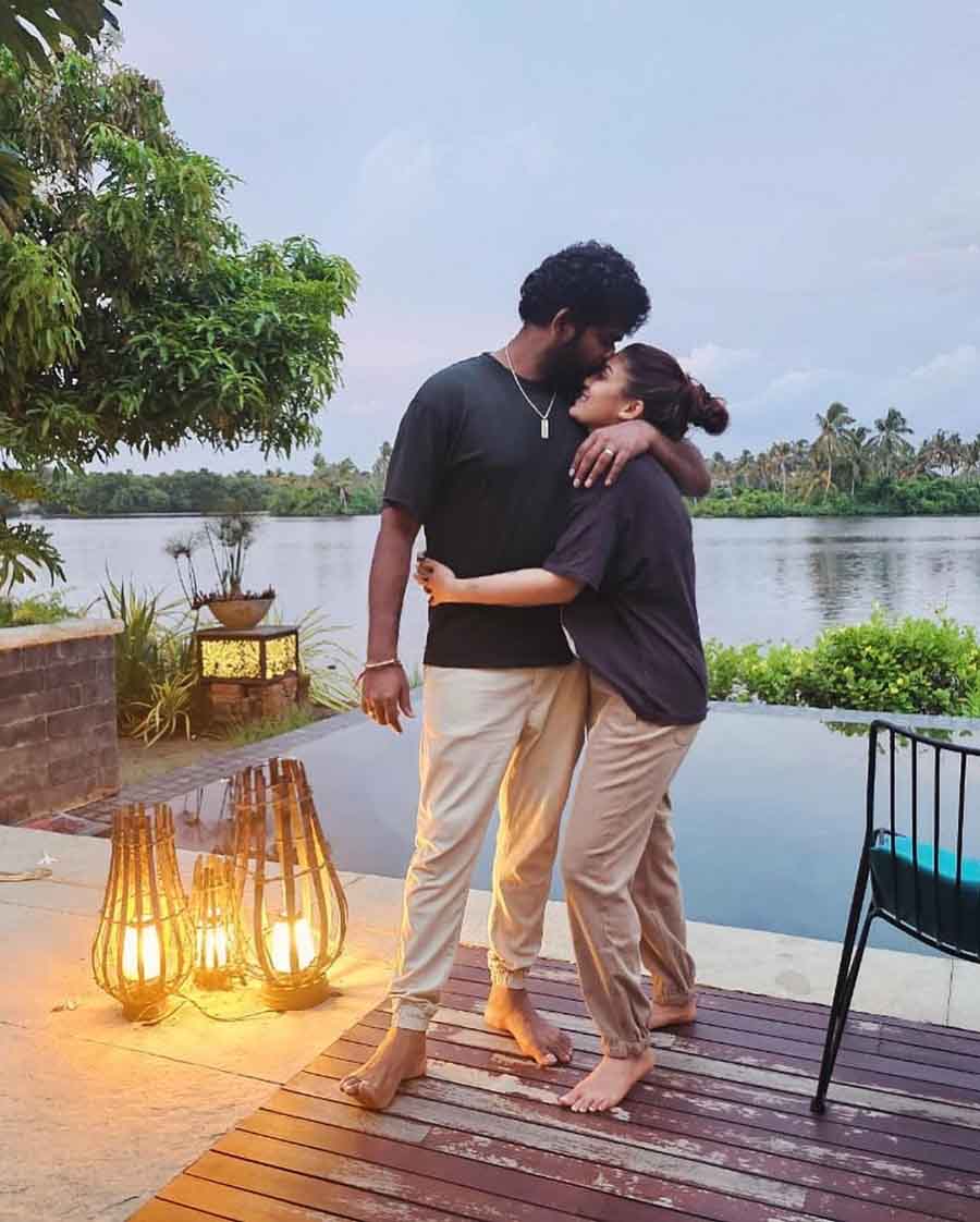 Actor-director Vignesh Shivan planted a kiss on Nayanthara’s forehead. The couple twinned in black t-shirts, which they paired with beige trousers. 