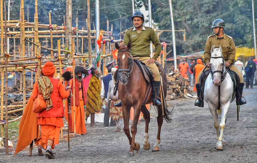 Mounted police patrolling at Babughat to maintain law and order as devotees arrive for Gangasagar Mela. The 10-day mela begins on January 8, 2024 