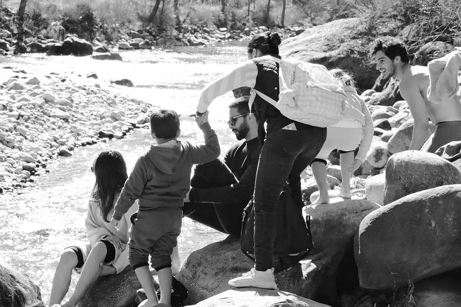 Shahid and Mira spent quality time with their family by the river. 