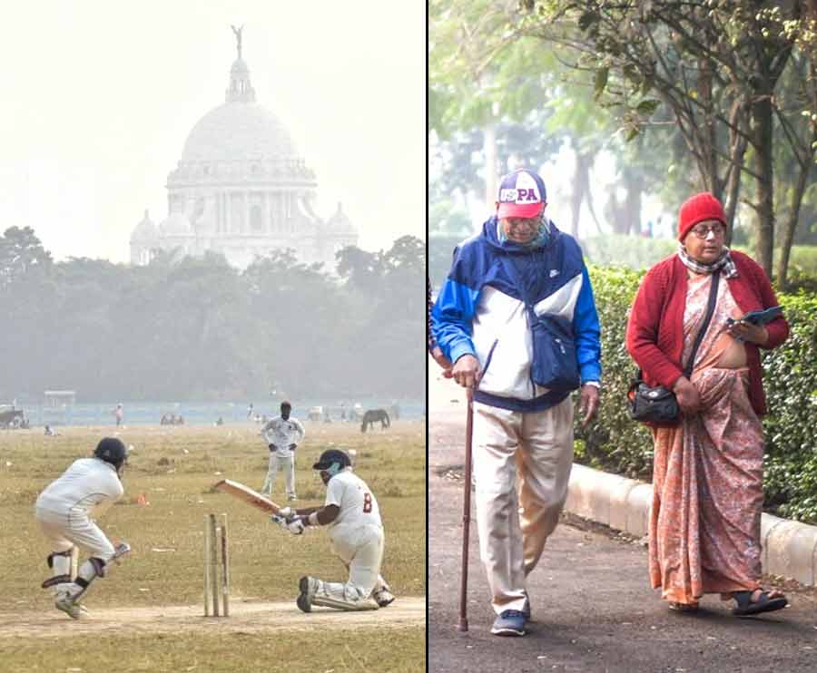 As the winter has set in, morning walkers at Dhakuria Lake take a stroll in their woollens on Thursday and youngsters play cricket at Maidan amid the fog. The lowest temperature recorded by IMD on Thursday was 15.3˚C 
