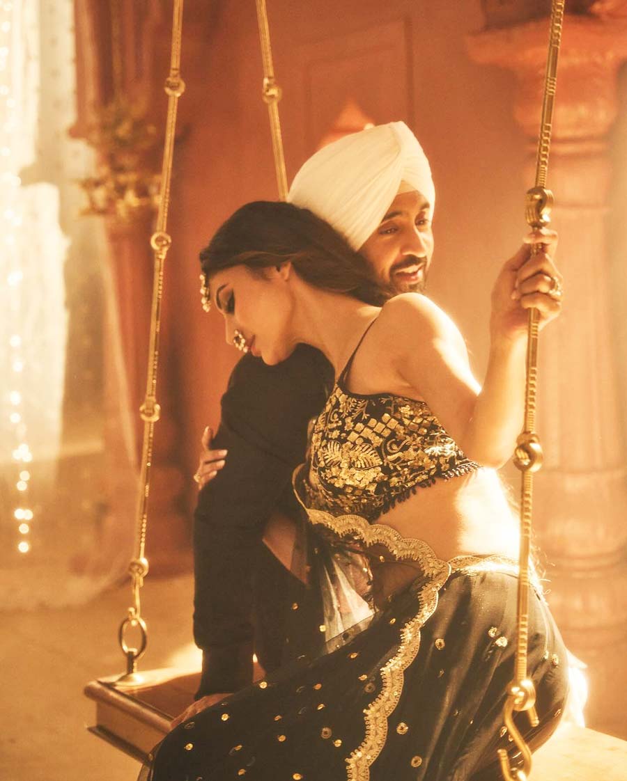 While the 38-year-old actress rocked a green-and-golden lehenga, Diljit looked dapper in a black outfit. 