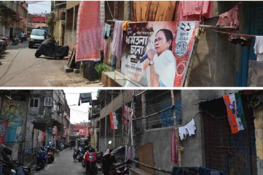 The hoarding in front of the complainant’s home in August and (below, in picture by Sanat Kr Sinha) removed on Saturday