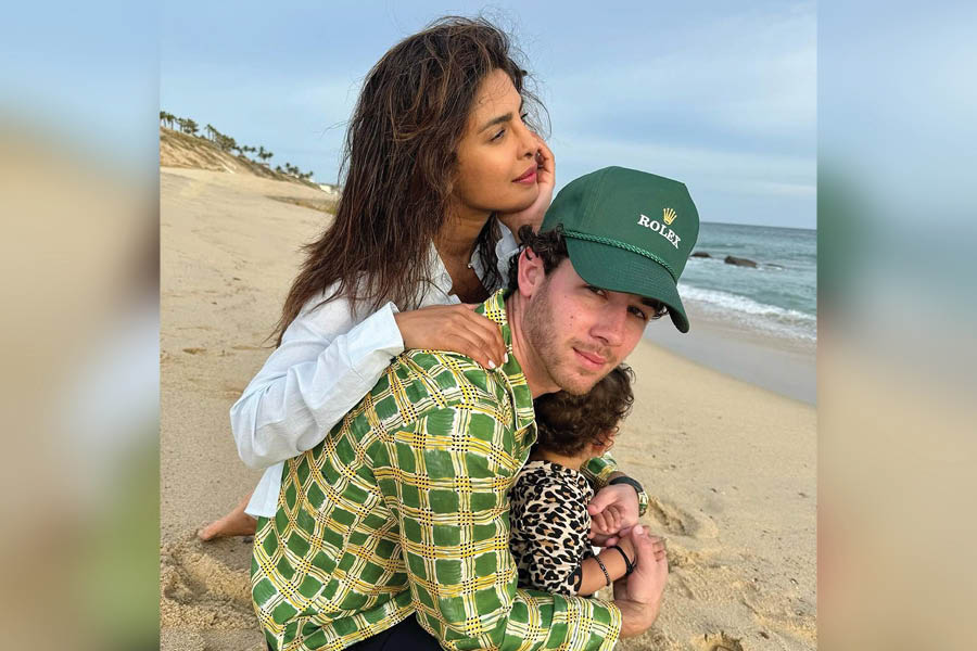 Priyanka Chopra and Nick Jonas with their daughter Malti Marie.