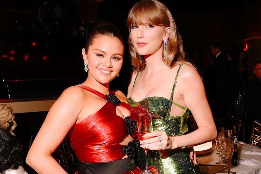 BFFs Selena Gomez and Taylor Swift beamed together at the lens. While Gomez stunned in a red silk dress, Taylor wore a shimmering green gown on the star-studded night.