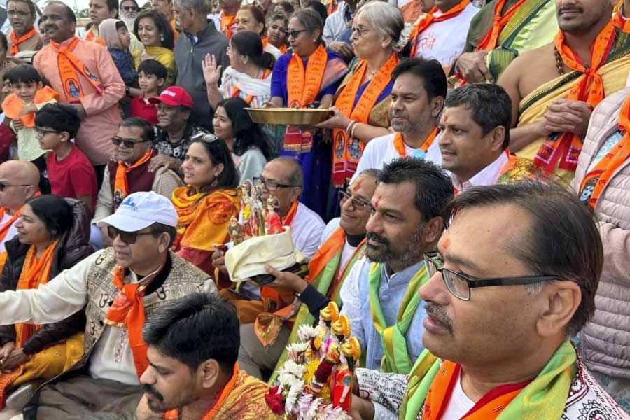 Members of the Hindu American community during a religious procession in view of the consecration ceremony of the Ram temple in Ayodhya, in Houston.
