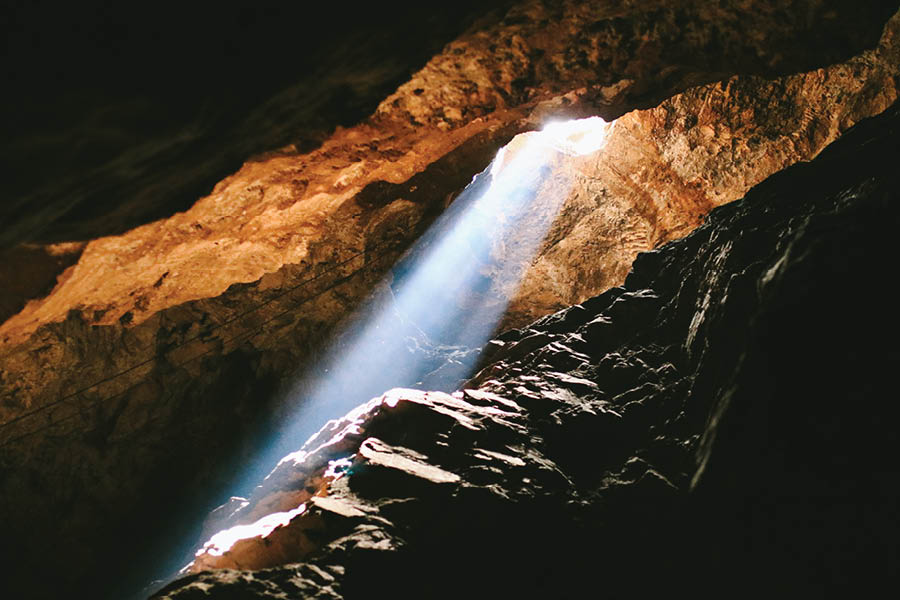 Light streams into a cave at the paleoanthropological site, Cradle of Humankind, in Johannesburg, South Africa – a place the author probably wouldn’t be able to visit without sports