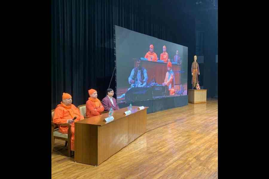 Swami Sarvapriyananda flanked by Swami Vishokananda and Hidco managing director Debashis Sen before delivering his speech at Viveka Tirtha in New Town on Sunday