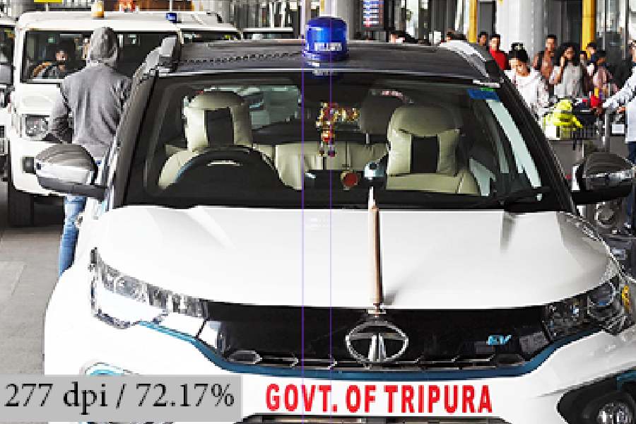A beacon-fitted car with a "Govt of Tripura" sticker: parked in front of the airport terminal, on the arrival level, on Friday afternoon. The car remained parked 1 there for over an hour.