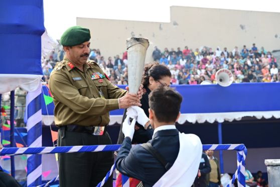 The Sports Captain handed over the sports torch to the Chief Guest Brigadier Raj Kumar Singh, Dy GoC, HQ Bengal Sub Area.  